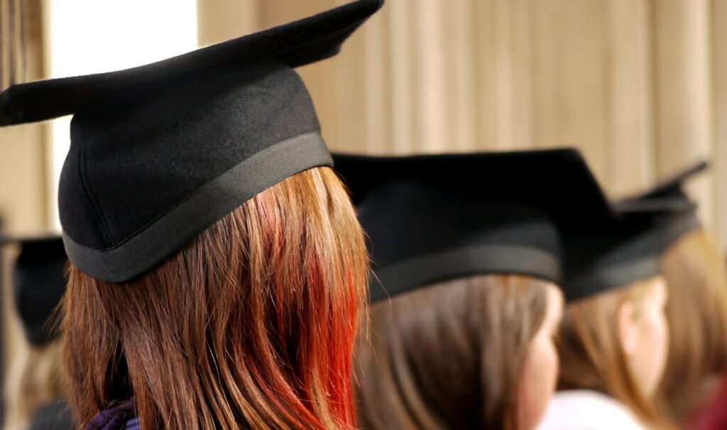 women on square academic caps