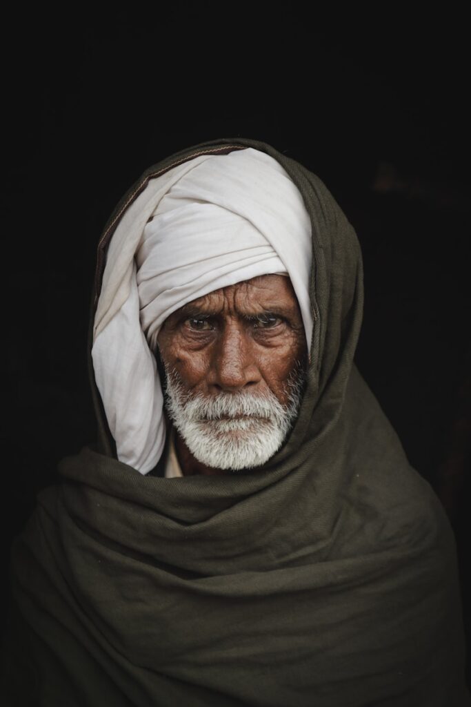 A man with a white turban on his head