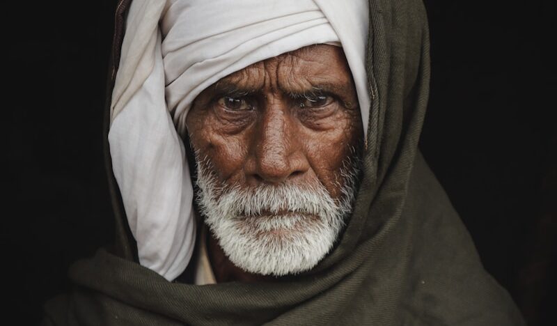 A man with a white turban on his head
