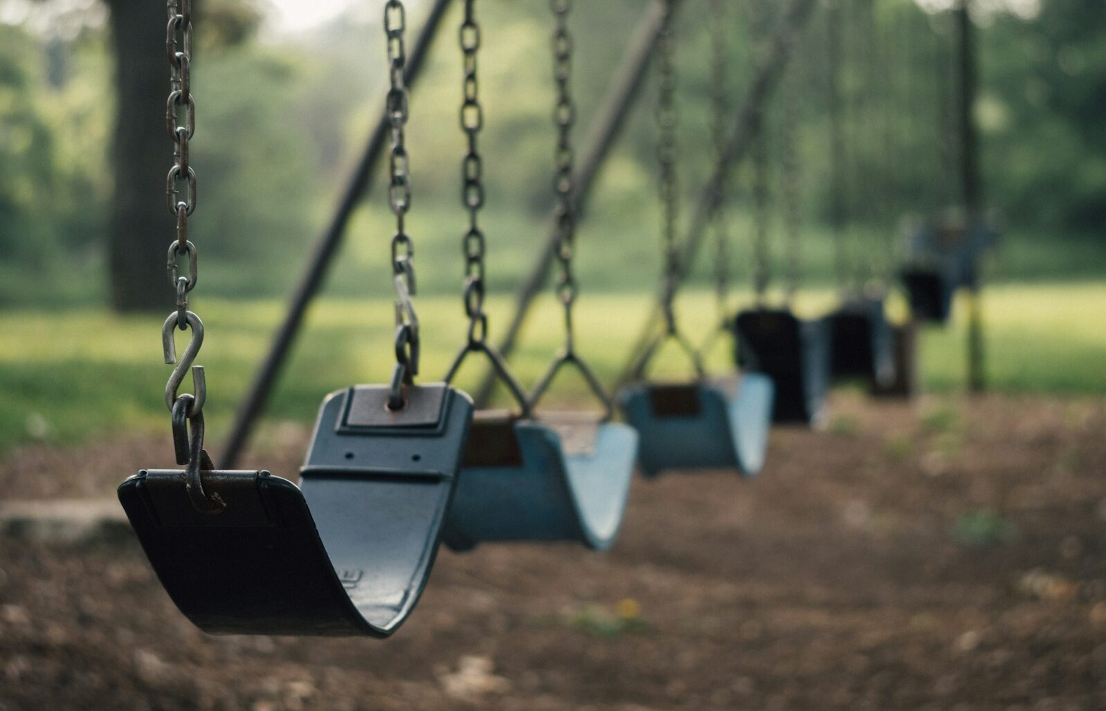 selective focus shot of outdoor swing