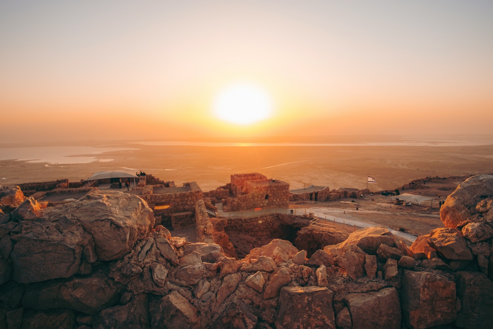 brown rock formation during sunset