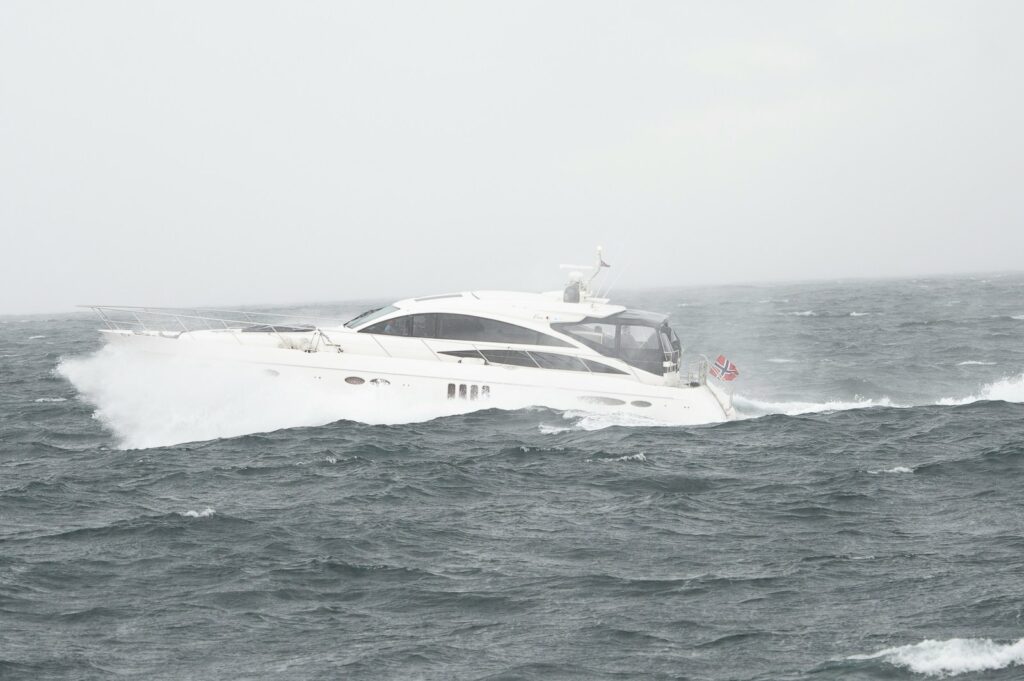 a large white boat in the middle of the ocean
