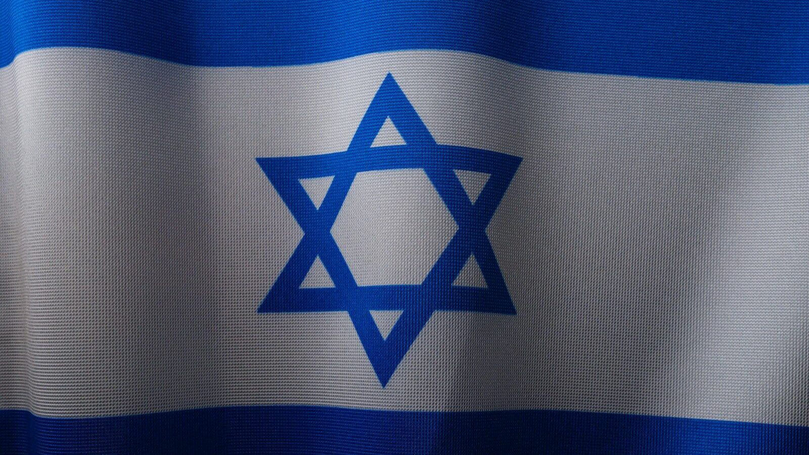 a close up of a flag with a star of david on it