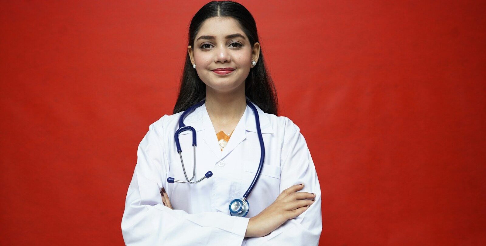 a woman in a white coat